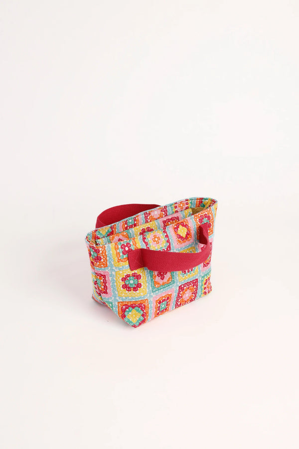 Pochette con chiusura zip folk